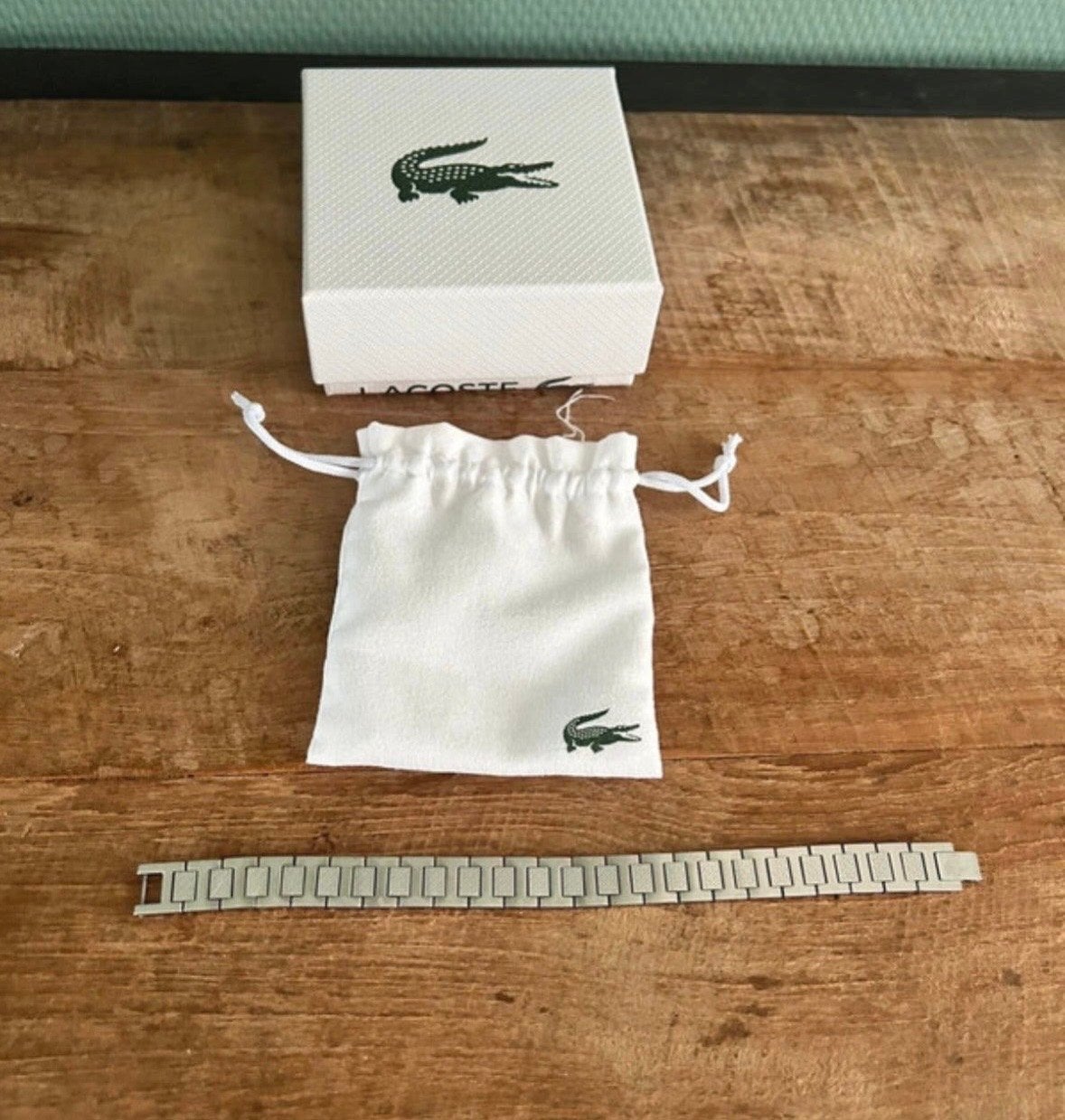 Lacoste schakelarmband heren - Stijlvol en tijdloos, Ophalen of Verzenden, Nieuw, Zilver, Staal