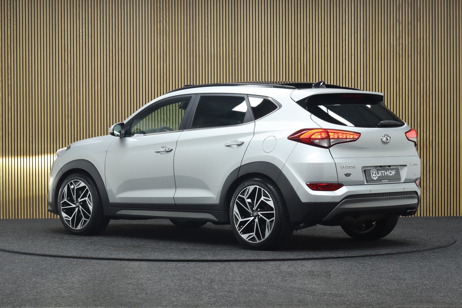 Hyundai Tucson 1.6 T-GDi Premium 4WD | Elek. Glazen Panorama, Auto's, Gebruikt, 4 cilinders, Leder, Bedrijf