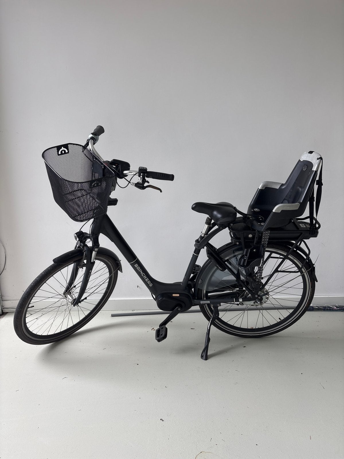 Brinckers elektrische fiets met kinderzitje en mand, Fietsen en Brommers, Elektrische fietsen, Gebruikt, Ophalen of Verzenden