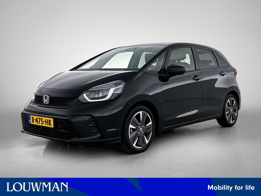 Honda Jazz 1.5 e:HEV Advance (bj 2023, automaat), Auto's, Honda, 12 maanden, 4 cilinders, Leder en Stof, Bedrijf