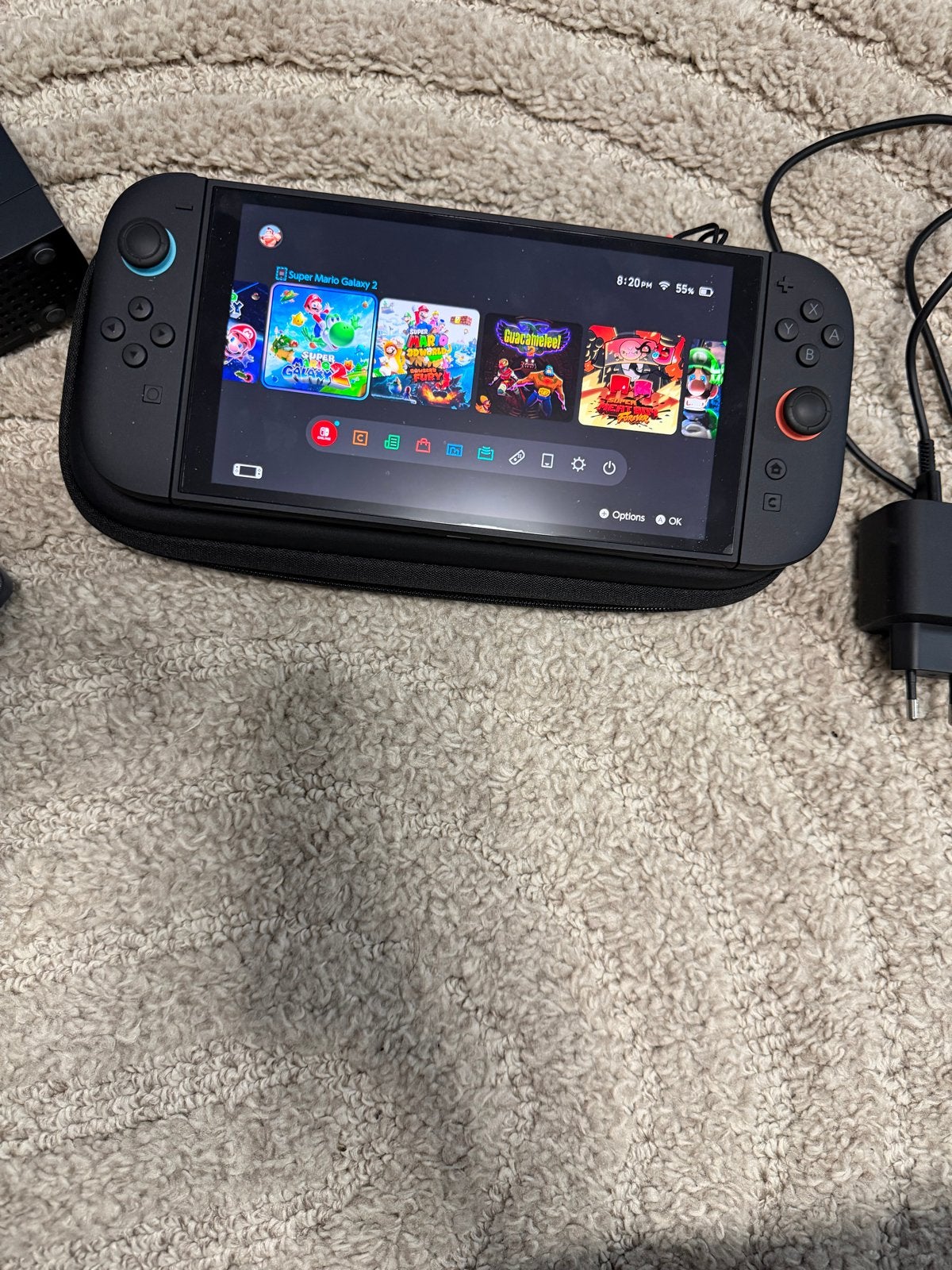 Nintendo Switch 2 (zo goed als nieuw) + hoesje en games, Met games, Zo goed als nieuw, Met 1 controller, Switch OLED