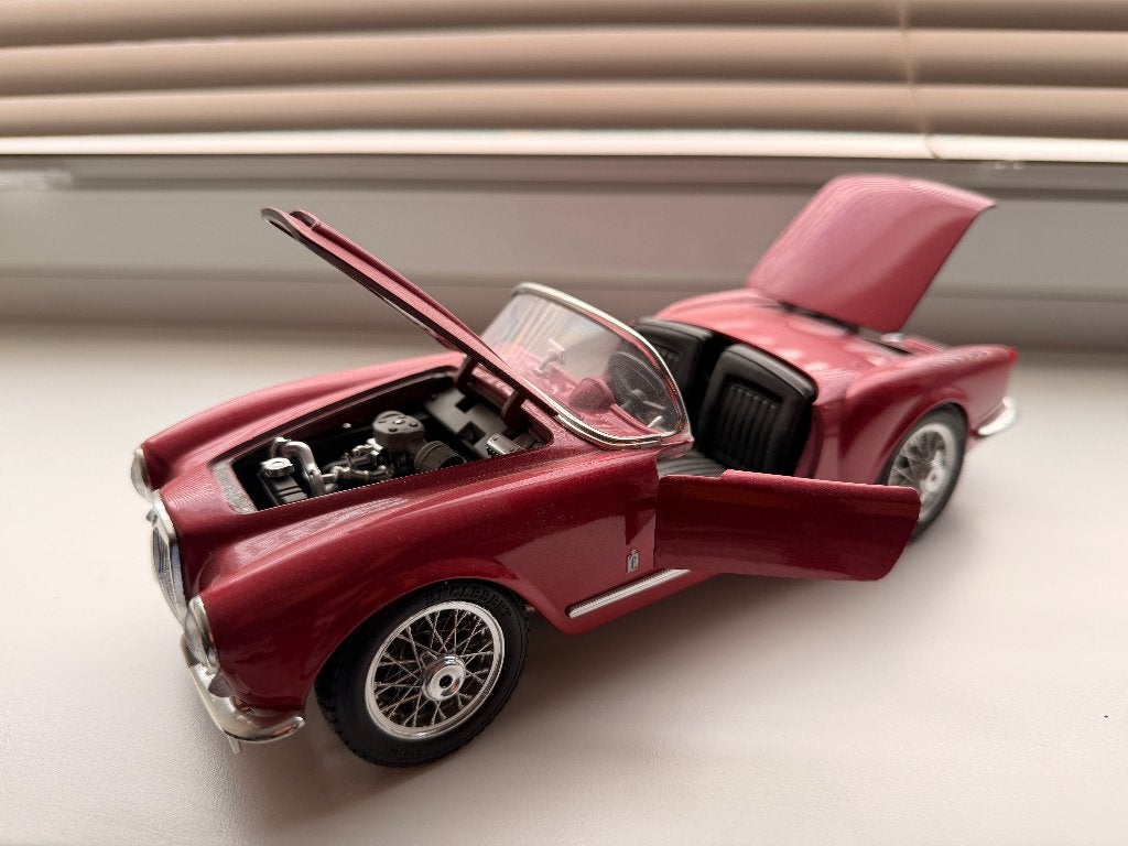 Bburago Lancia Aurelia B24 SPIDER 1955 Rood schaal 01:18, Ophalen, Zo goed als nieuw, Auto, Bburago