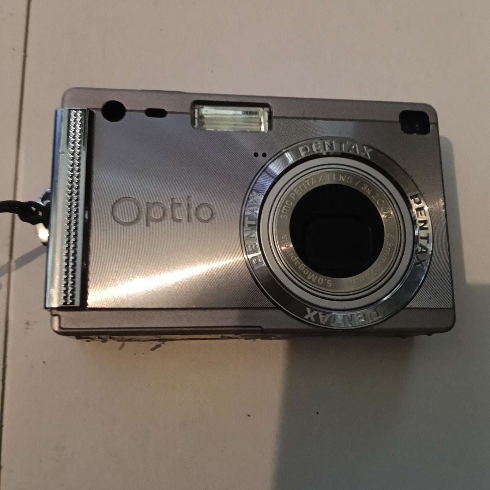 Pentax Optio S5i Compactcam 5.0 Megapixels verkleurd touw, Audio, Tv en Foto, Ingebouwde flitser, Gebruikt, Ophalen of Verzenden