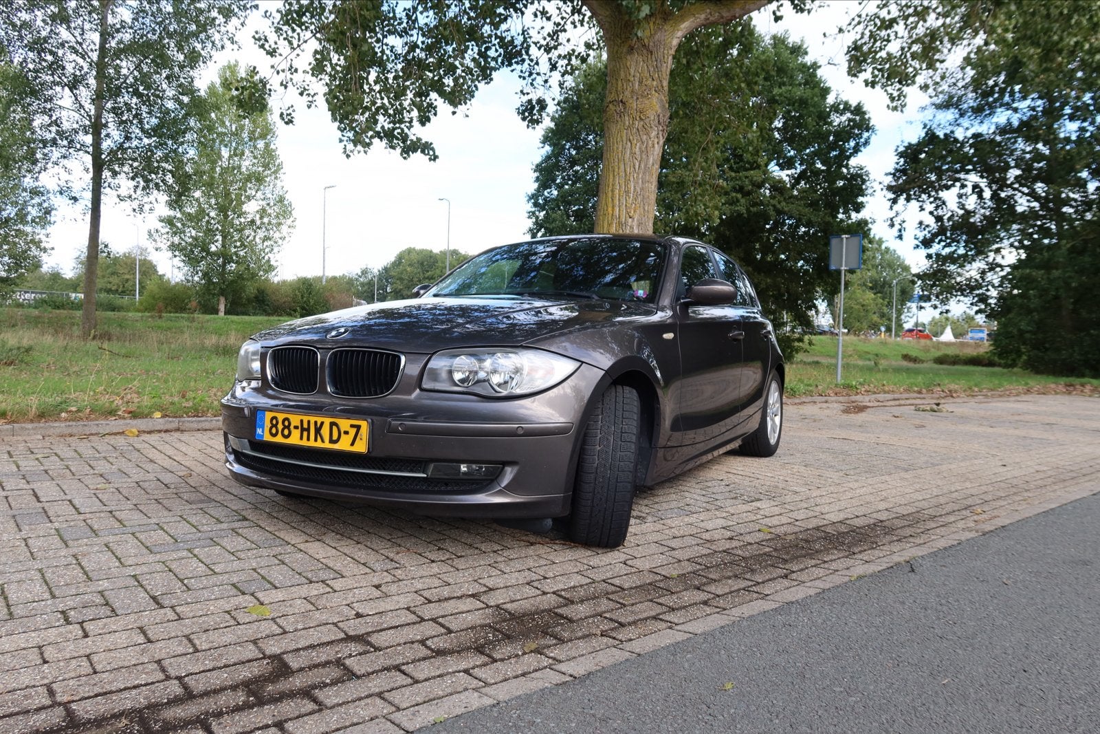 BMW 116I 5DR 2009 Bruin, Auto's, 1-Serie, 4 cilinders, Bruin, 122 pk