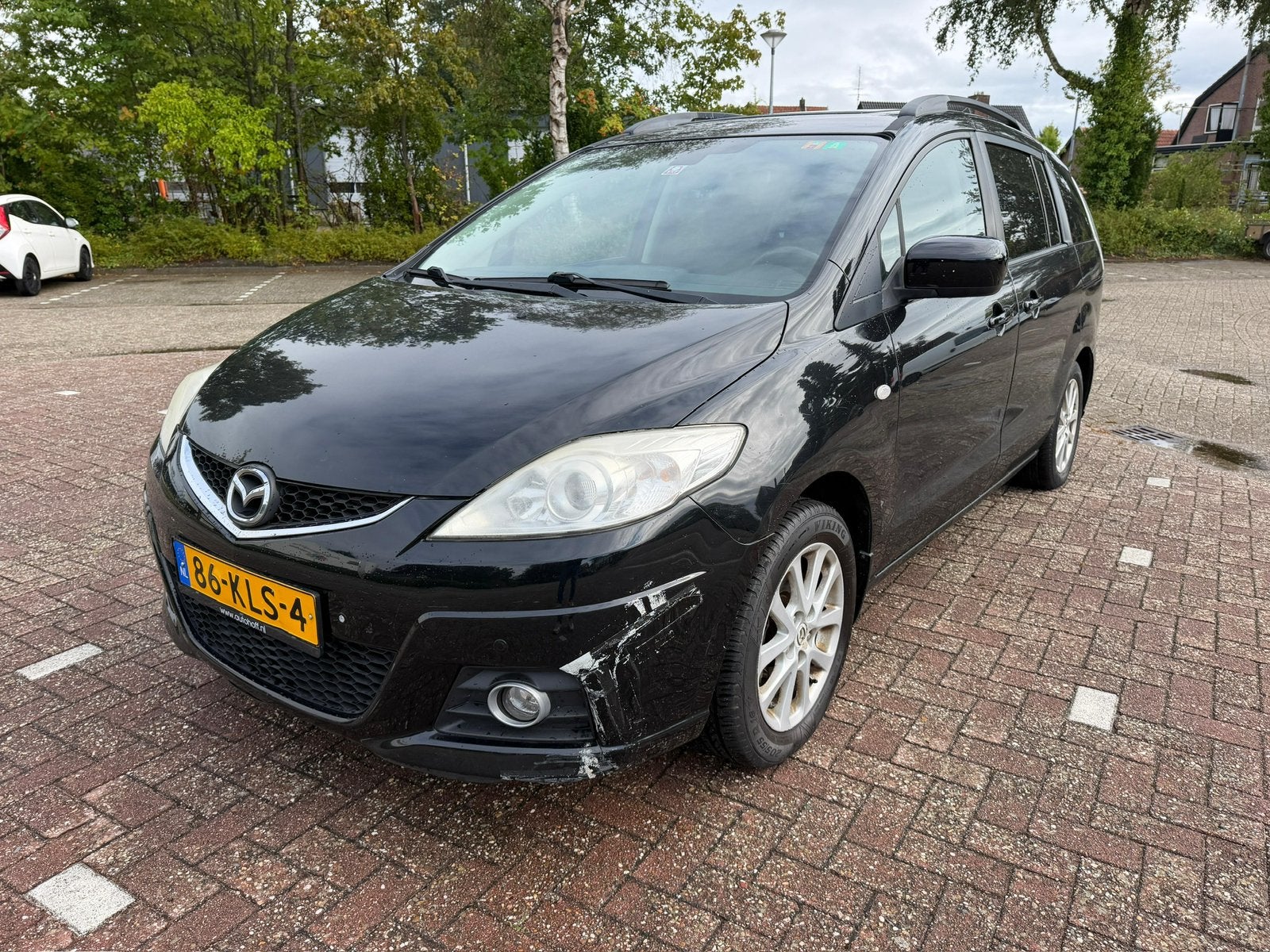 Mazda 5 2.0 2010 Zwart, Auto's, Mazda, 145 pk, Zwart, 4 cilinders, 7 stoelen