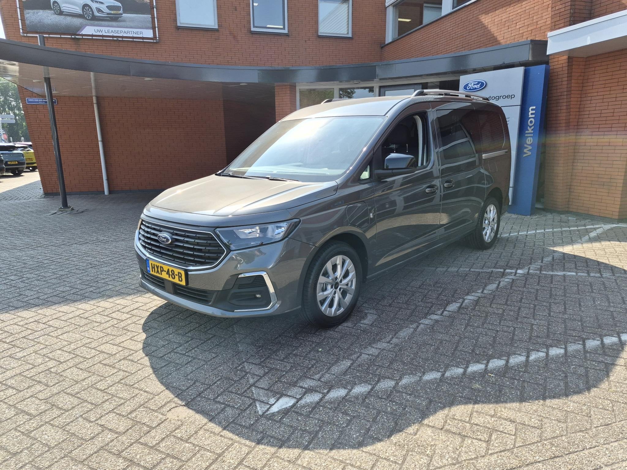 Ford Tourneo Connect Titanium 1.5 PHEV 7 persoons, Auto's, Ford, Stof, Gebruikt, 4 cilinders, 150 pk