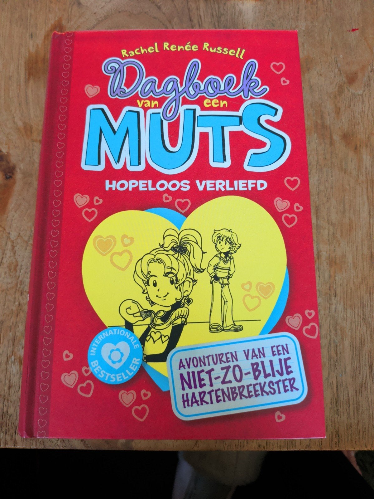 Rachel Renée Russell - Hopeloos verliefd, Boeken, Kinderboeken | Jeugd | 10 tot 12 jaar, Ophalen of Verzenden, Zo goed als nieuw