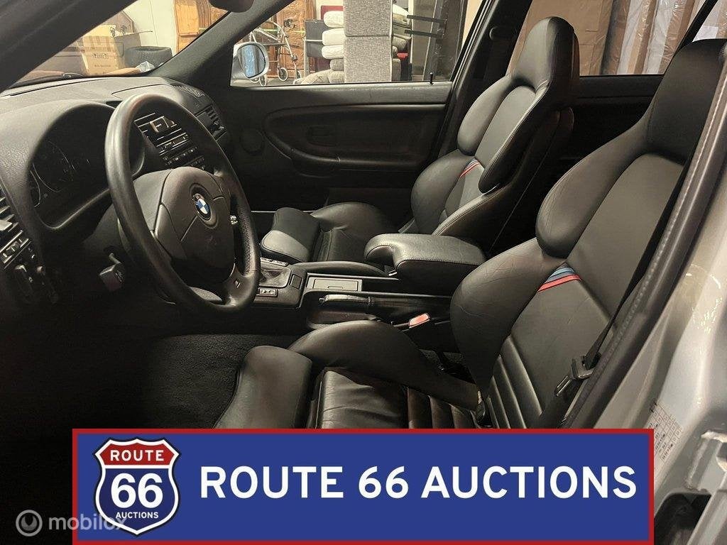 BMW M3 Sedan (E36) | 1996 | Route 66 Auctions, Auto's, Overige carrosserieën, Zwart, Bedrijf, Handgeschakeld