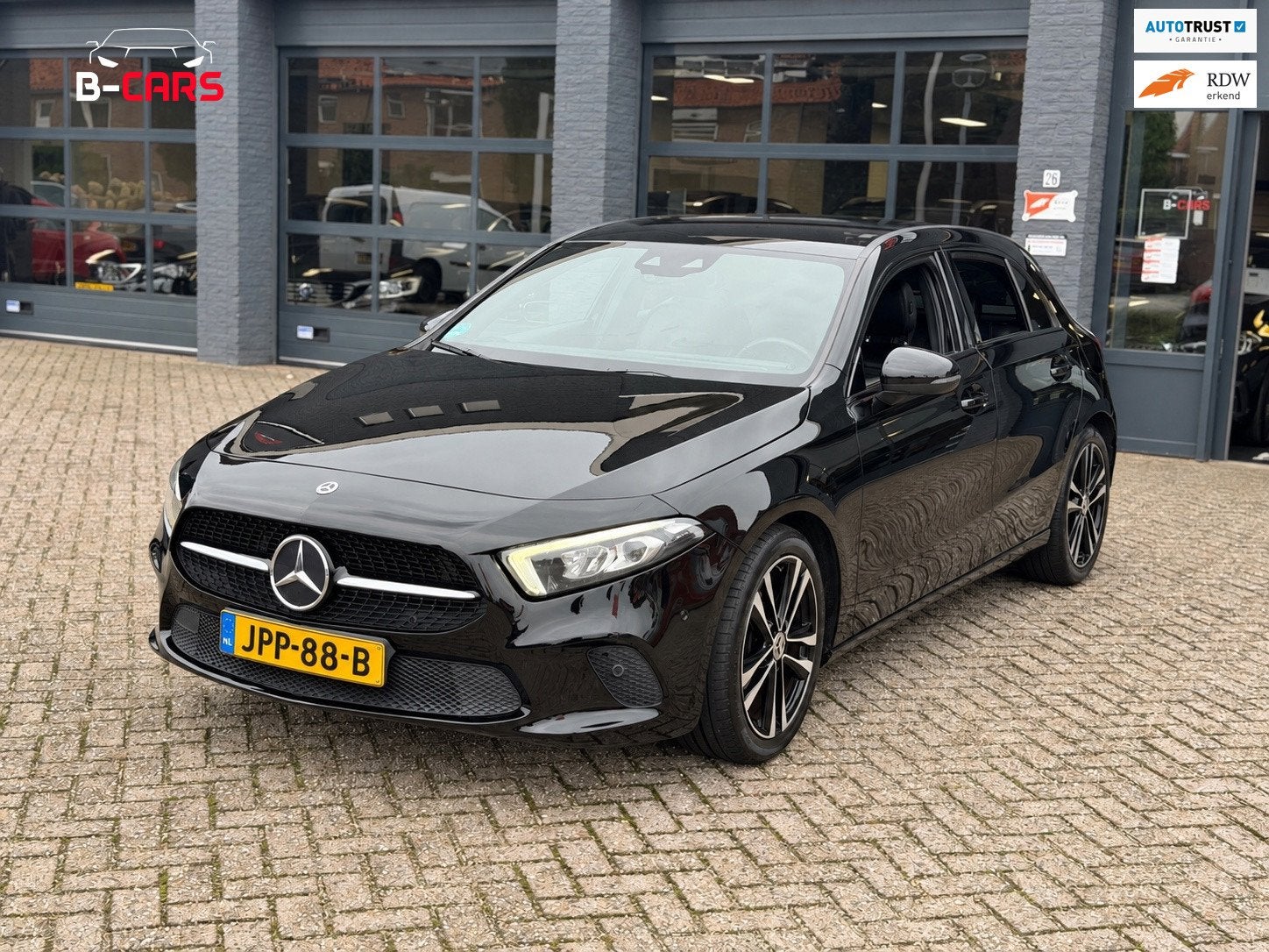 Mercedes-Benz A-klasse 180 AMG | Camera|AmbiLight|Nap|Stoelv, 136 pk, Gebruikt, 4 cilinders, Zwart