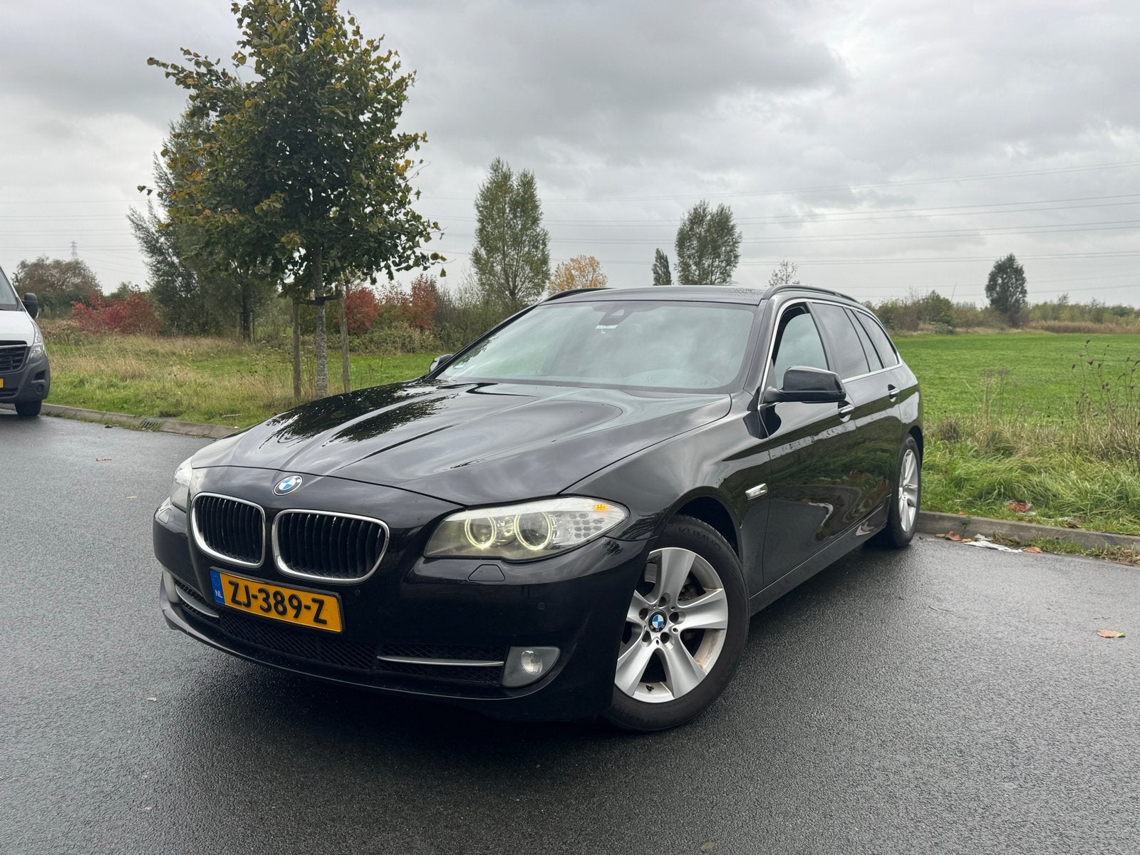BMW 5-Serie 2.0 520D Touring AUT 2013 Zwart, Auto's, Achterwielaandrijving, 1995 cc, Zwart, 2000 kg