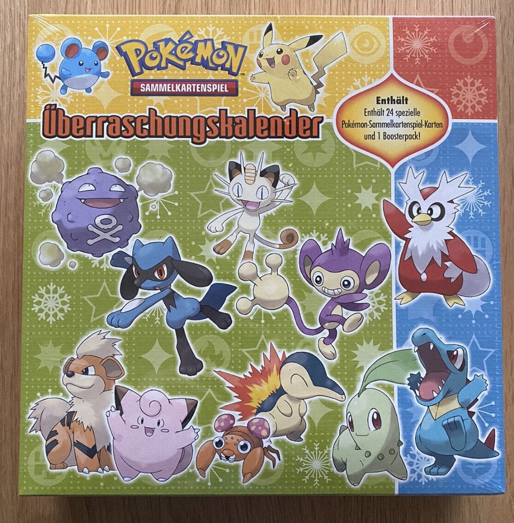 pokemon surprise kalender snowflake stamped cards box sealed, Ophalen of Verzenden, Zo goed als nieuw, Meerdere kaarten, Foil