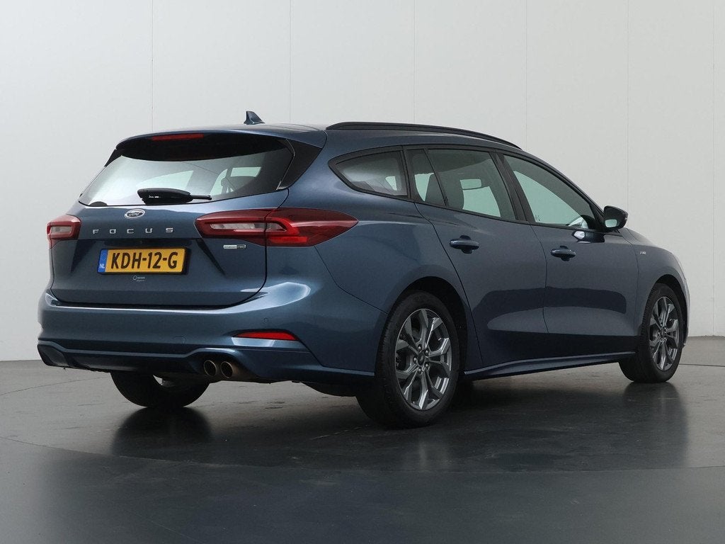 Ford Focus Wagon 1.0 EcoBoost Hybrid ST Line | Parkeercamera, Gebruikt, 1404 kg, Blauw, 3 cilinders