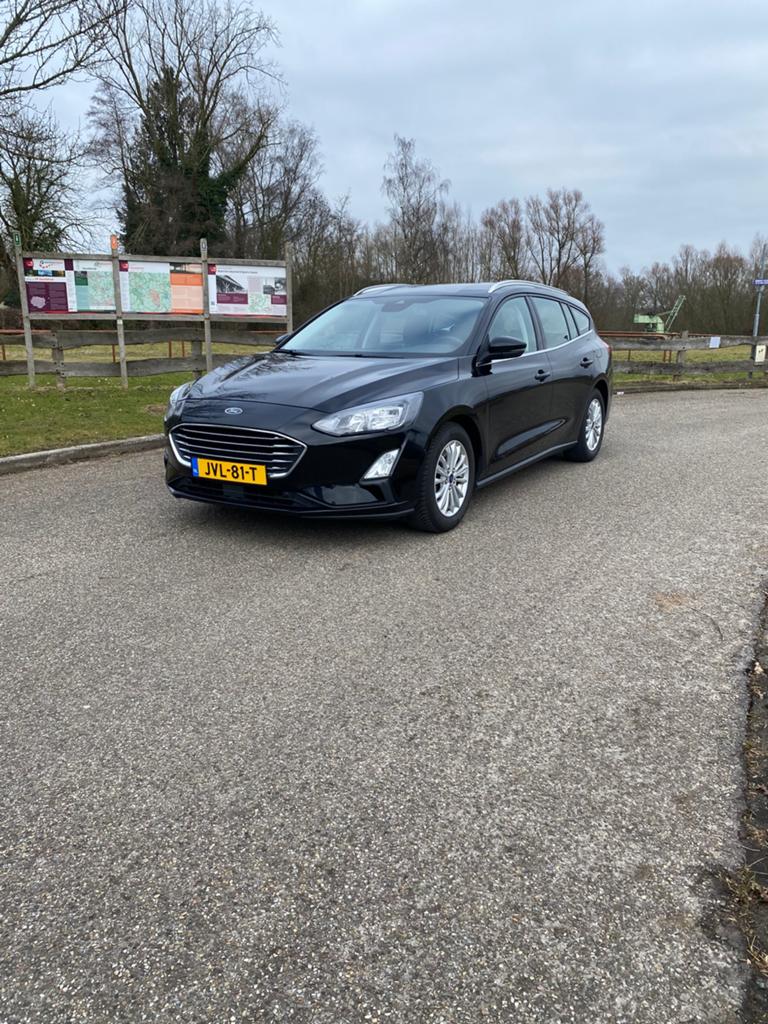 Ford Focus 1.0 Ecoboost Titanium Hybrid 125pk 2021 Zwart, Zwart, Navigatiesysteem, 19 km/l, 1319 kg