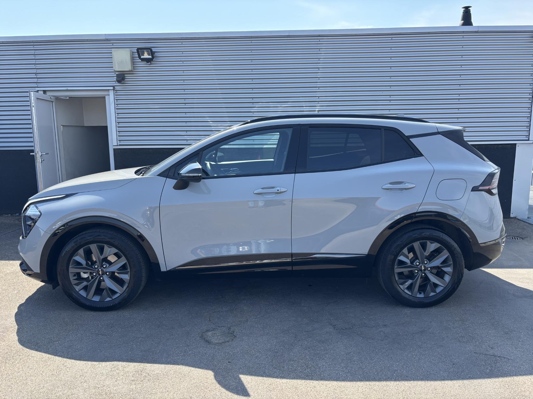 Kia Sportage 1.6 T-GDi Hybrid Dark Edition NL-auto, Nieuw ge, Auto's, Gebruikt, Euro 6, 4 cilinders, 1360 kg
