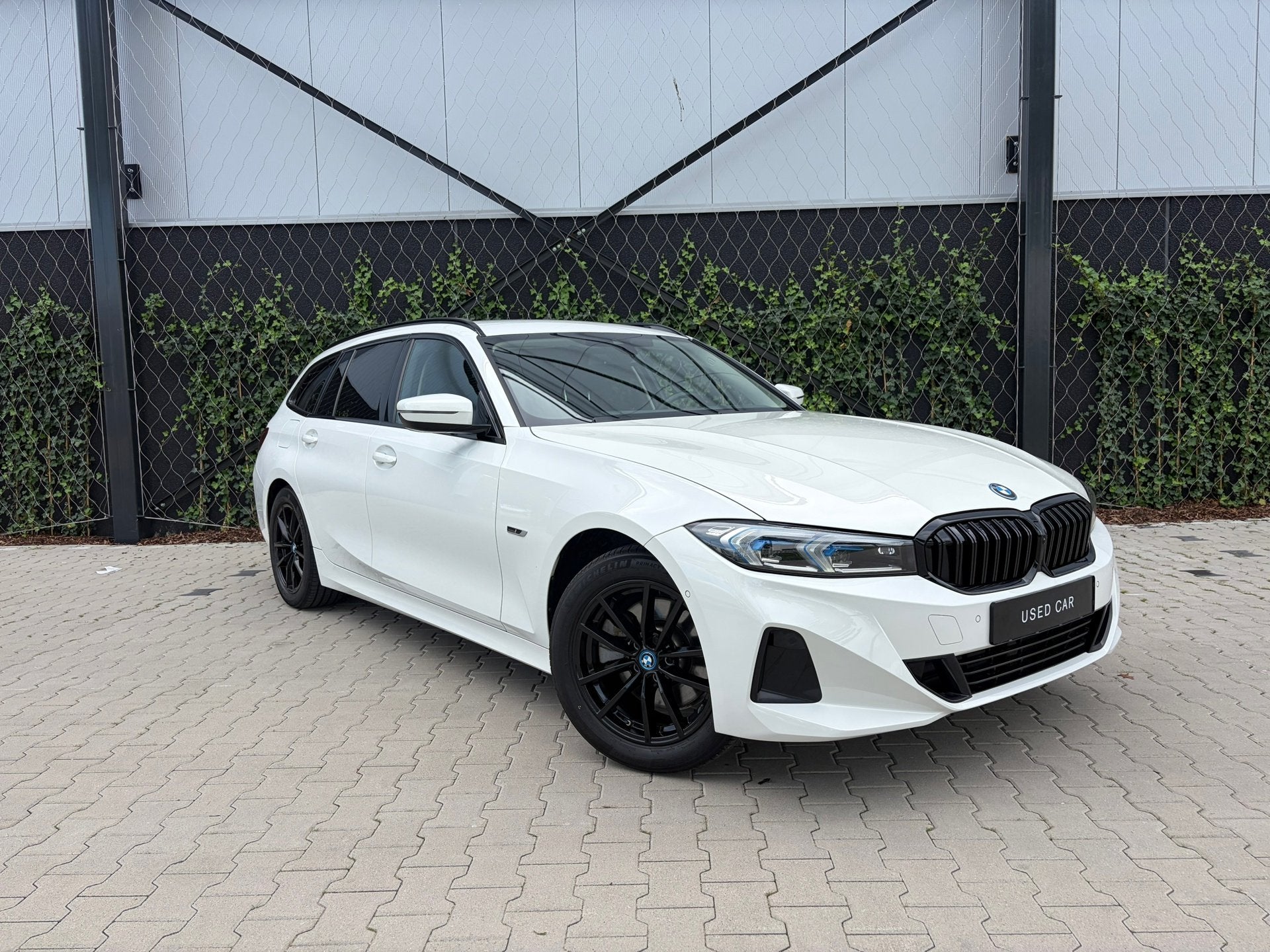 BMW 3-serie Touring 320e xDrive |Innovation Pack|Adaptive LE, Auto's, Stof, Gebruikt, Zwart, 4 cilinders