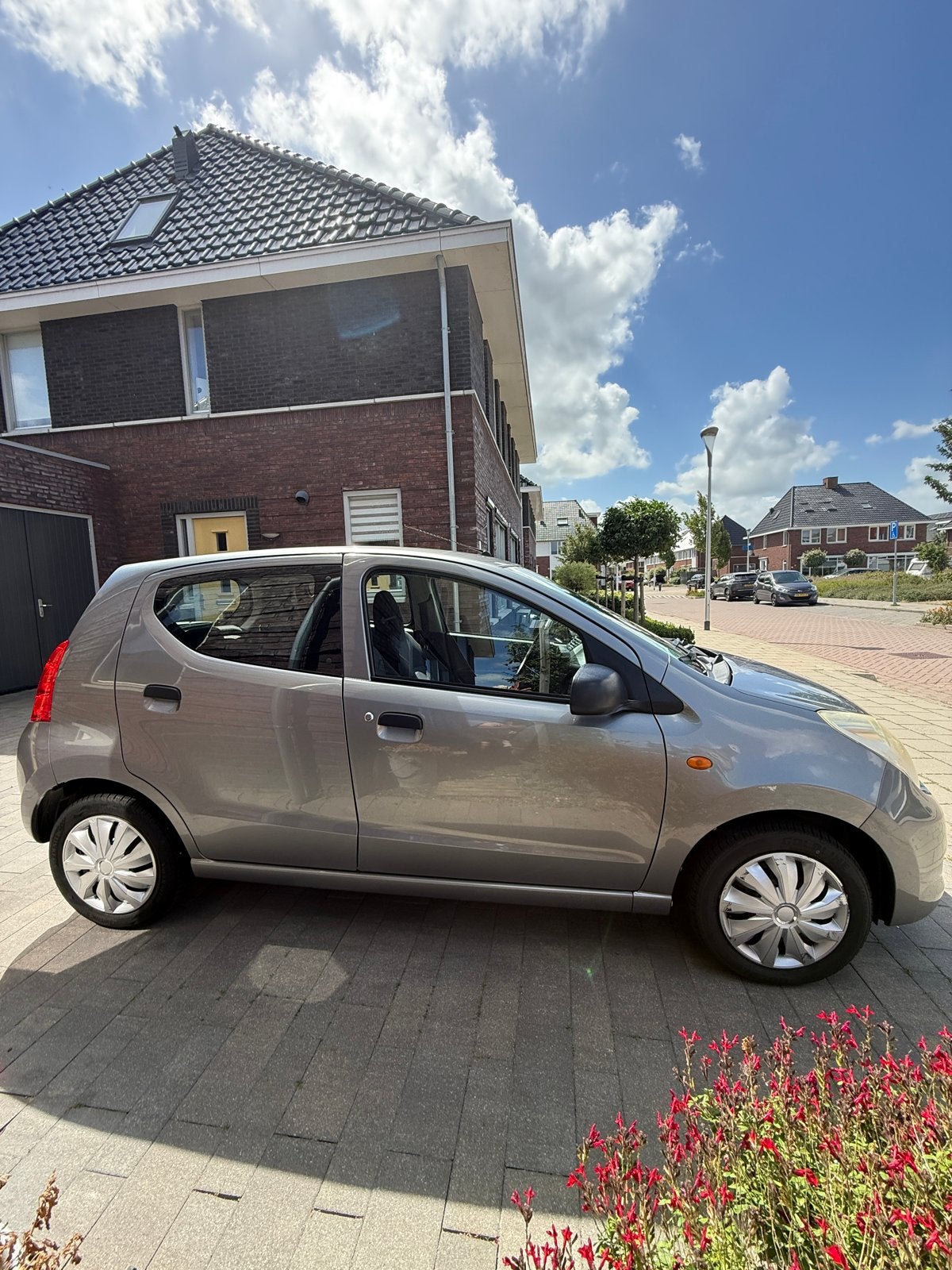 Suzuki Alto 1.0 2014 Grijs, Auto's, Voorwielaandrijving, 200 kg, 4 stoelen, Origineel Nederlands
