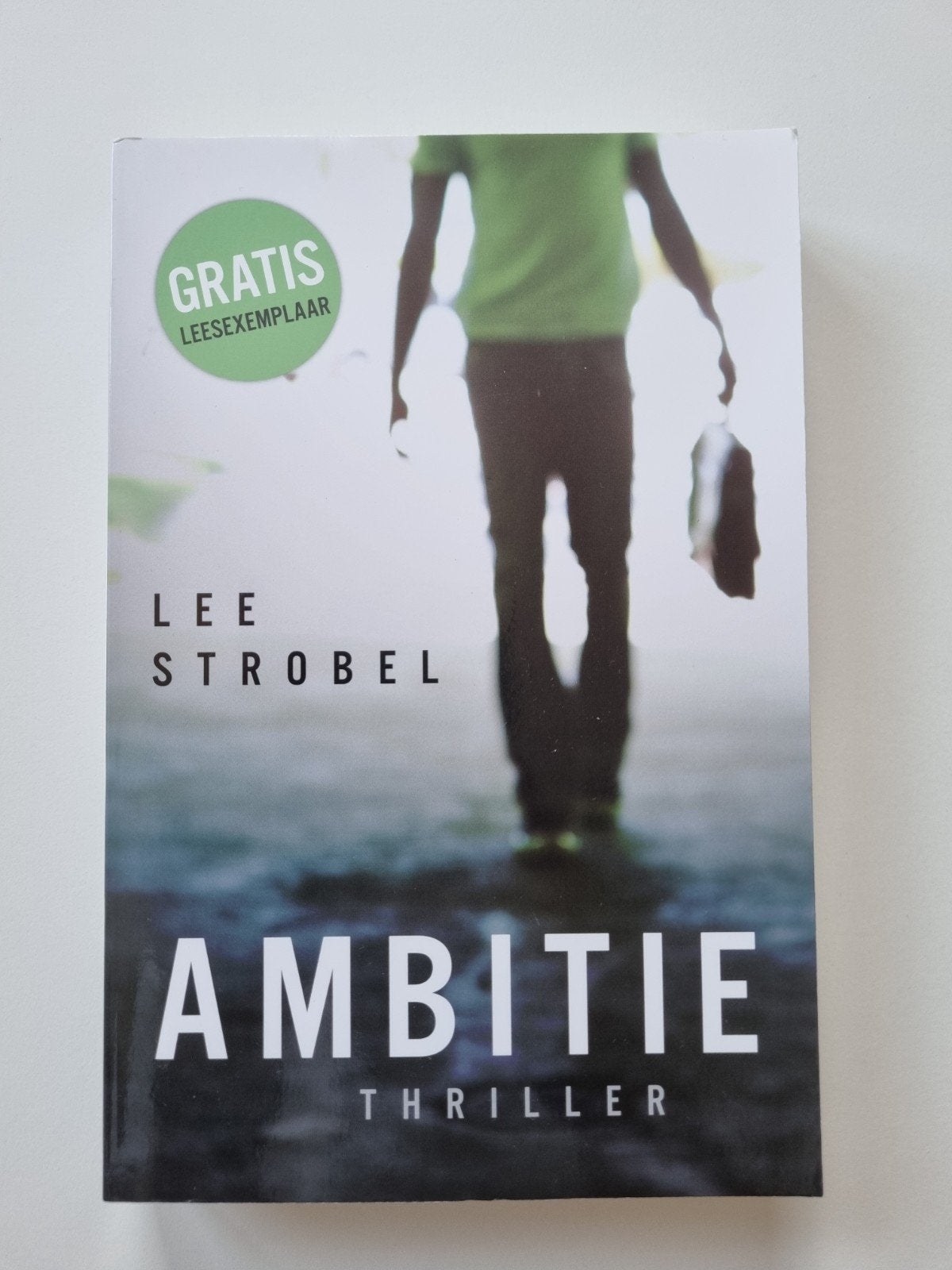 Ambitie - Lee Strobel (Thriller) - Gratis leesexemplaar, Boeken, Ophalen of Verzenden, Zo goed als nieuw, Lee Strobel, Nederland
