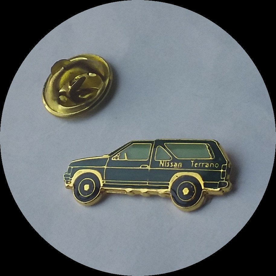 NISSAN Terrano pin, groen, Ophalen of Verzenden, Zo goed als nieuw, Transport, Speldje of Pin