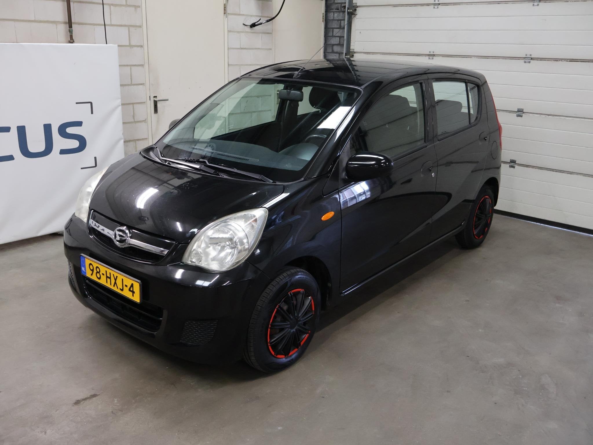 Daihatsu Cuore 1.0 Premium 2e eigenaar NAP Airco APK, Auto's, Daihatsu, Voorwielaandrijving, Stof, 4 stoelen, Cuore