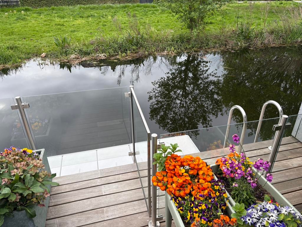 Glazen hekwerk met RVS staanders en poort. (Totaal 12m), Ophalen of Verzenden, Zo goed als nieuw, Overige materialen, Met poort