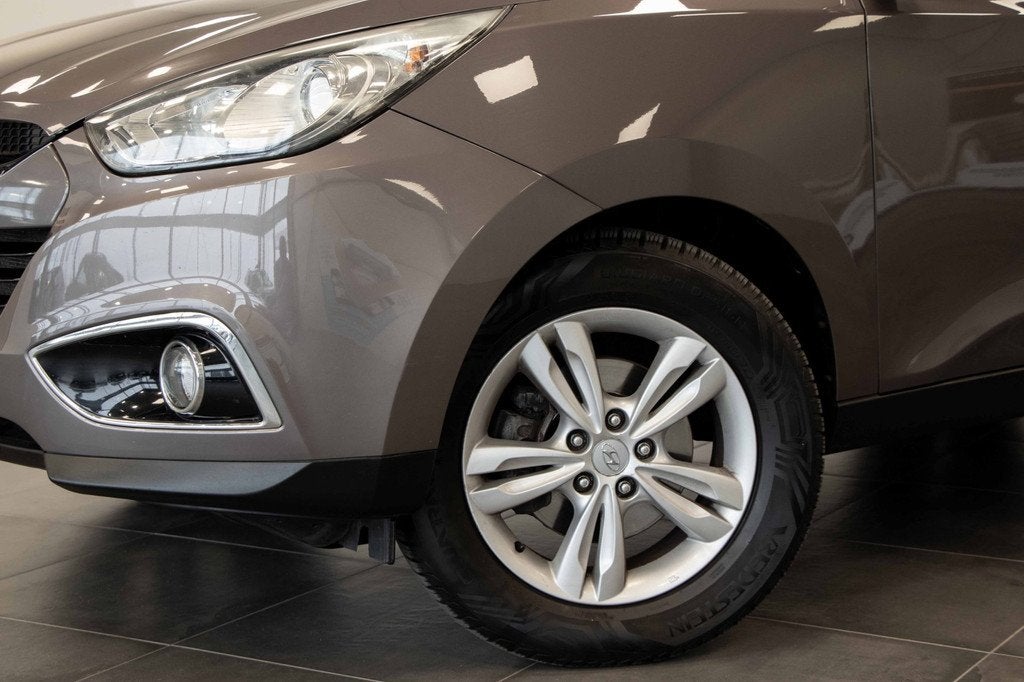 Hyundai Ix35 2.0i Business Edition | Automaat | Navigatie |, Auto's, Hyundai, Gebruikt, Zwart, 4 cilinders, Bruin