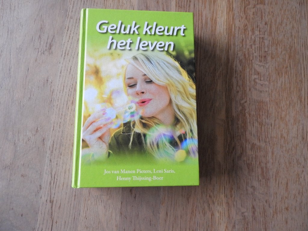 Streekroman Geluk Kleurt het leven., Ophalen of Verzenden, Zo goed als nieuw, Jos van Manen Pieters