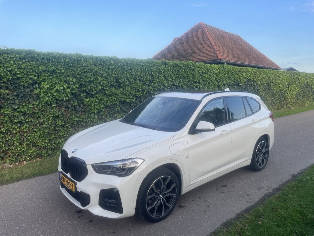 BMW X1 xDrive25e High Exec. (bj 2021, automaat), Auto's, 125 pk, Gebruikt, Wit, Leder
