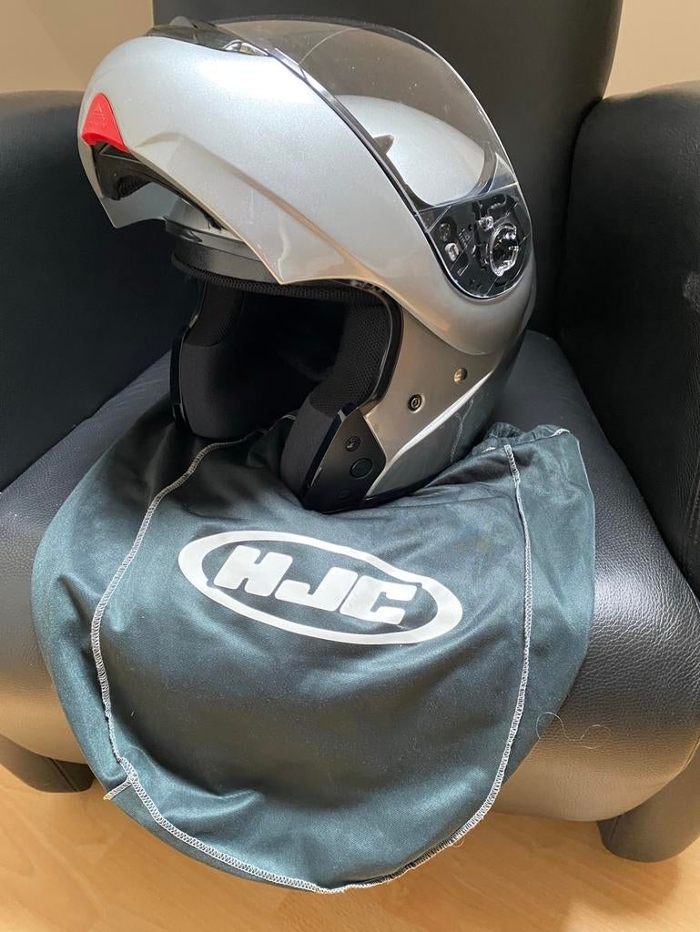 Te koop HJC motorhelm Kleur zilvergrijs zgan., Motoren, Ophalen, Tweedehands, Integraalhelm, HJC