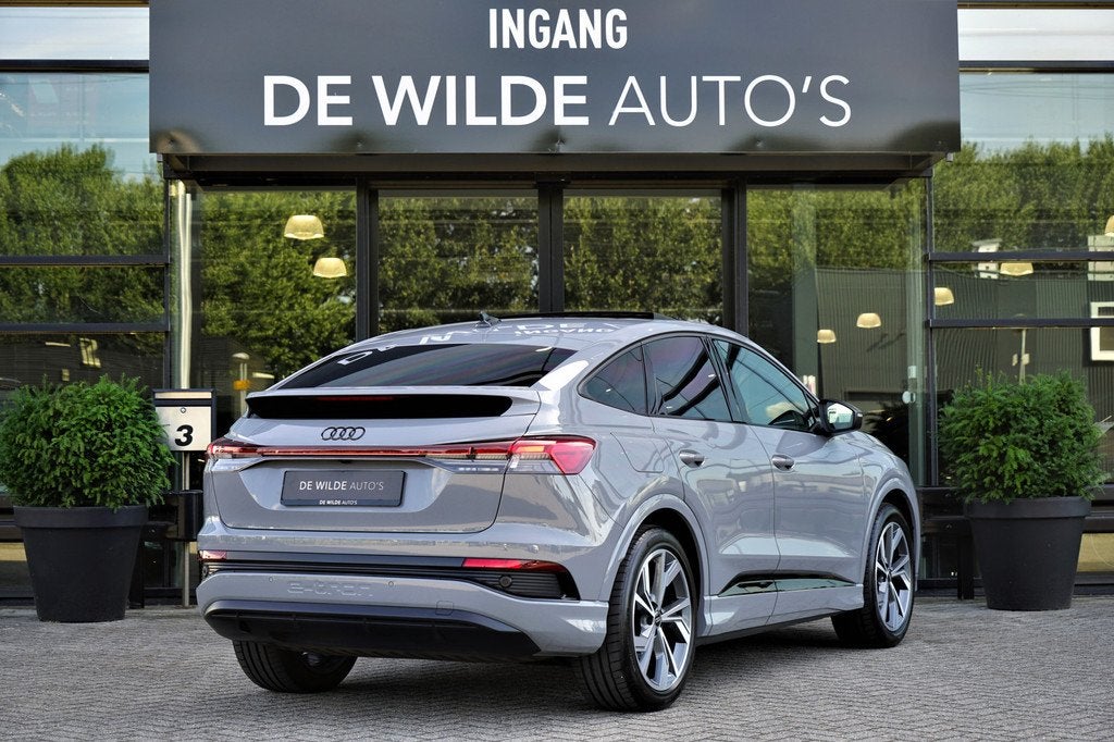 Audi Q4 Sportback e-tron 40 S-line 204pk Pano Sonos Camera K, Auto's, Audi, Automaat, Achterwielaandrijving, Gebruikt, Leder en Stof
