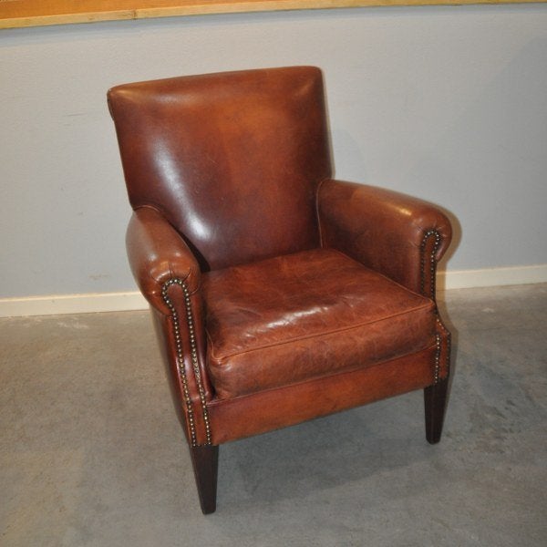 Kleine schapenleren fauteuil, Ophalen