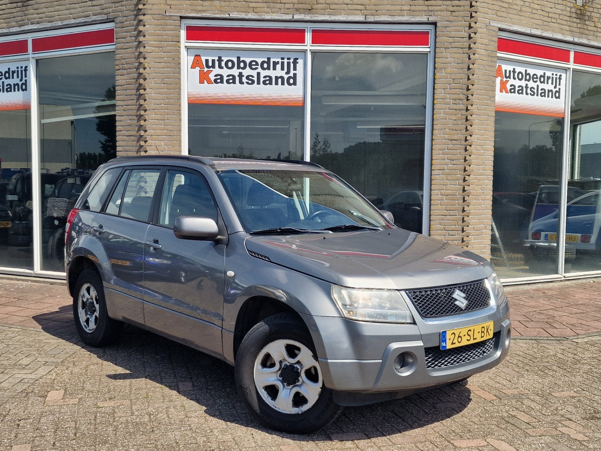Suzuki Grand Vitara 2.0-16V JLX - Airco - 4x4 -, Auto's, Suzuki, Zwart, 4 cilinders, 1850 kg, Grand Vitara