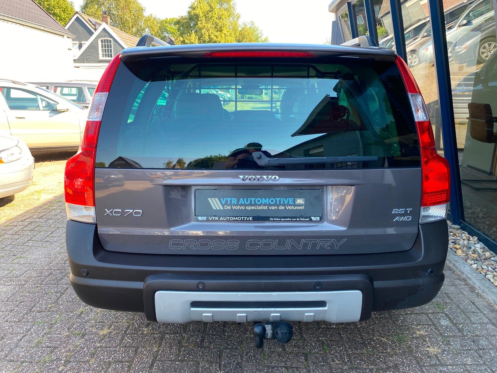 Volvo XC70 2.5 T Summum AWD Automaat LEER / XENON / TREKHAAK, Auto's, Volvo, Automaat, Gebruikt, Zwart, Bruin