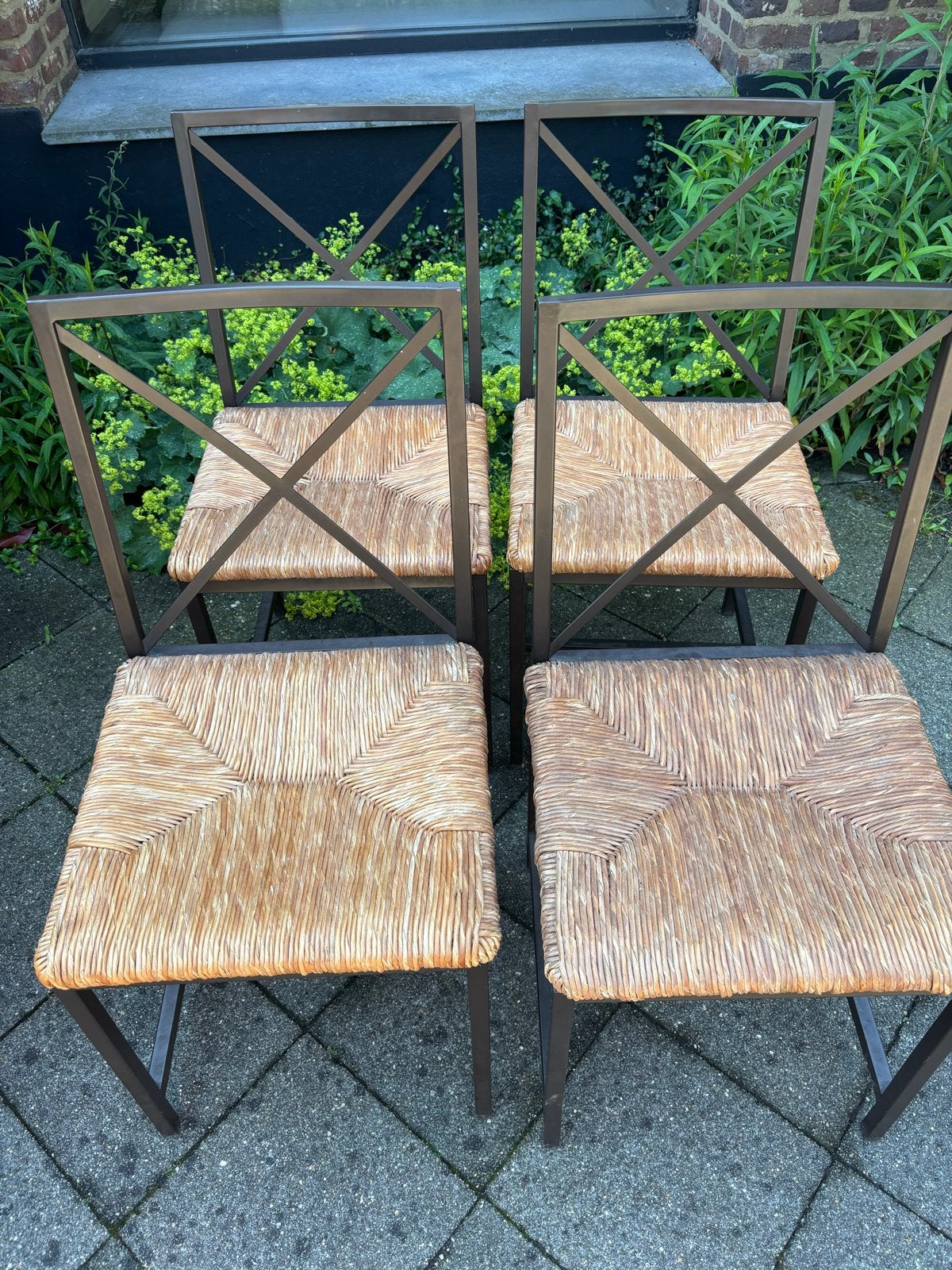 Set van 4 klassieke rotan stoektjes met stalen frame, Antiek en Kunst, Ophalen