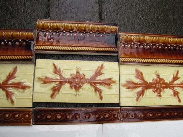 45 art nouveau tegels warmgeel met roodbruine afbeelding, Ophalen