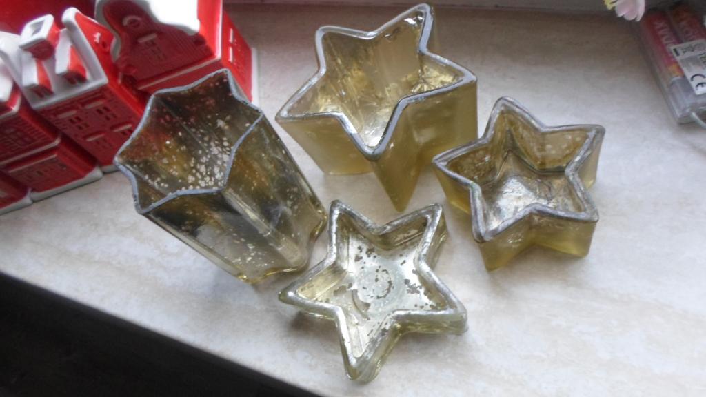 4  x verschillende armeluis sterren waxinelichten, Ophalen of Verzenden, Gebruikt, Overige materialen, Minder dan 25 cm