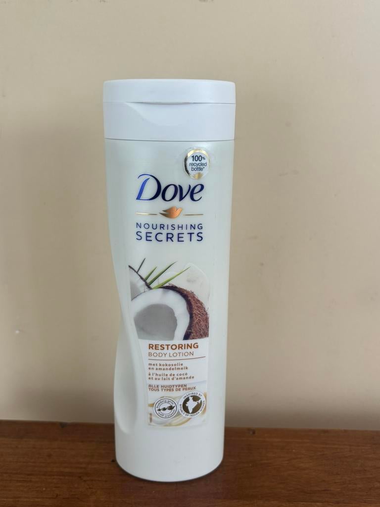Dove Nourishing Secrets Restoring Bodylotion kokos, Ophalen of Verzenden, Nieuw, Bodylotion, Crème of Olie