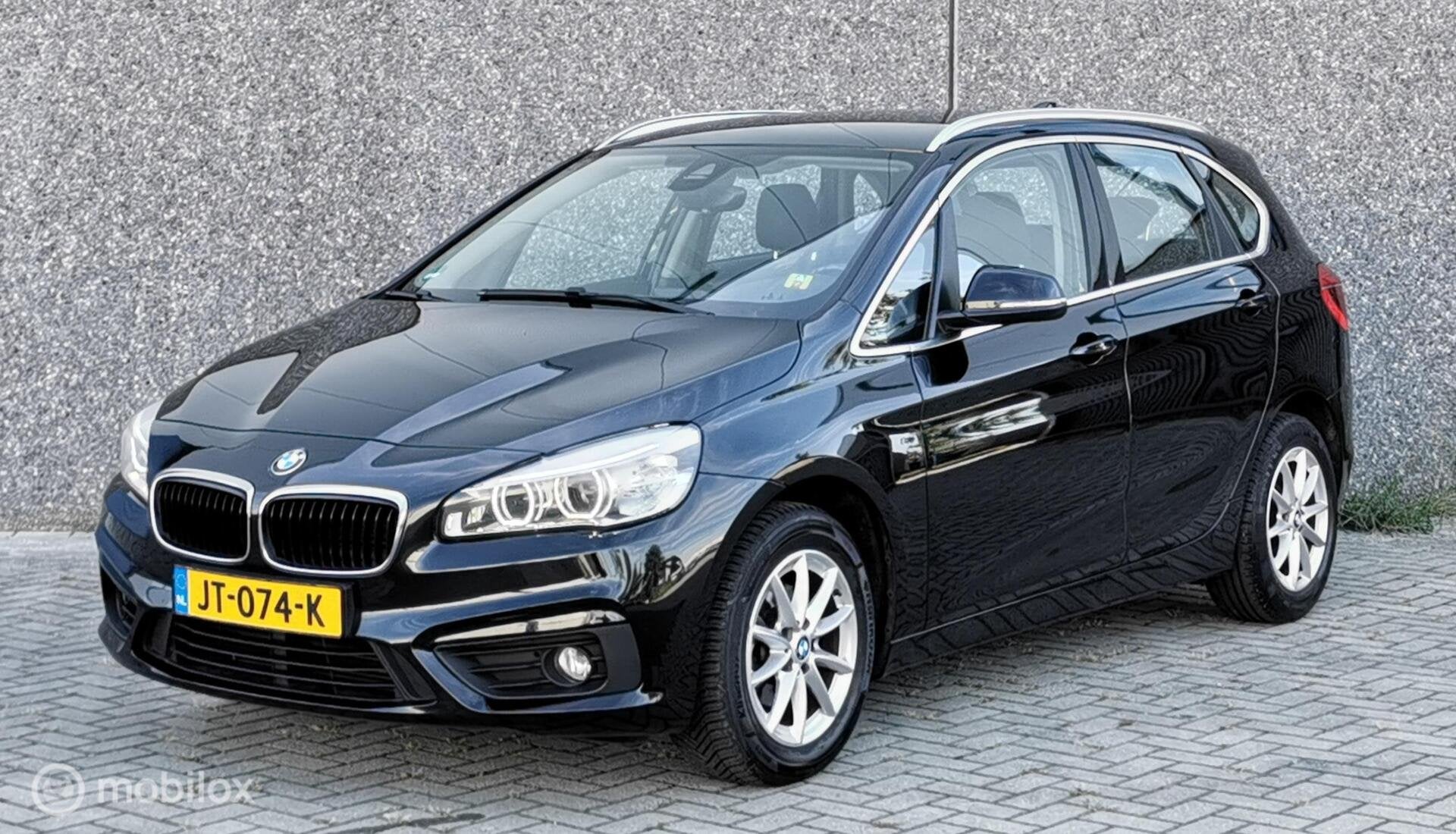 BMW 2-SERIE ACTIVE TOURER 216i 102PK/NAP/NAVI/LED/PDC/CRUISE, Auto's, Voorwielaandrijving, Stof, Zwart, Bedrijf