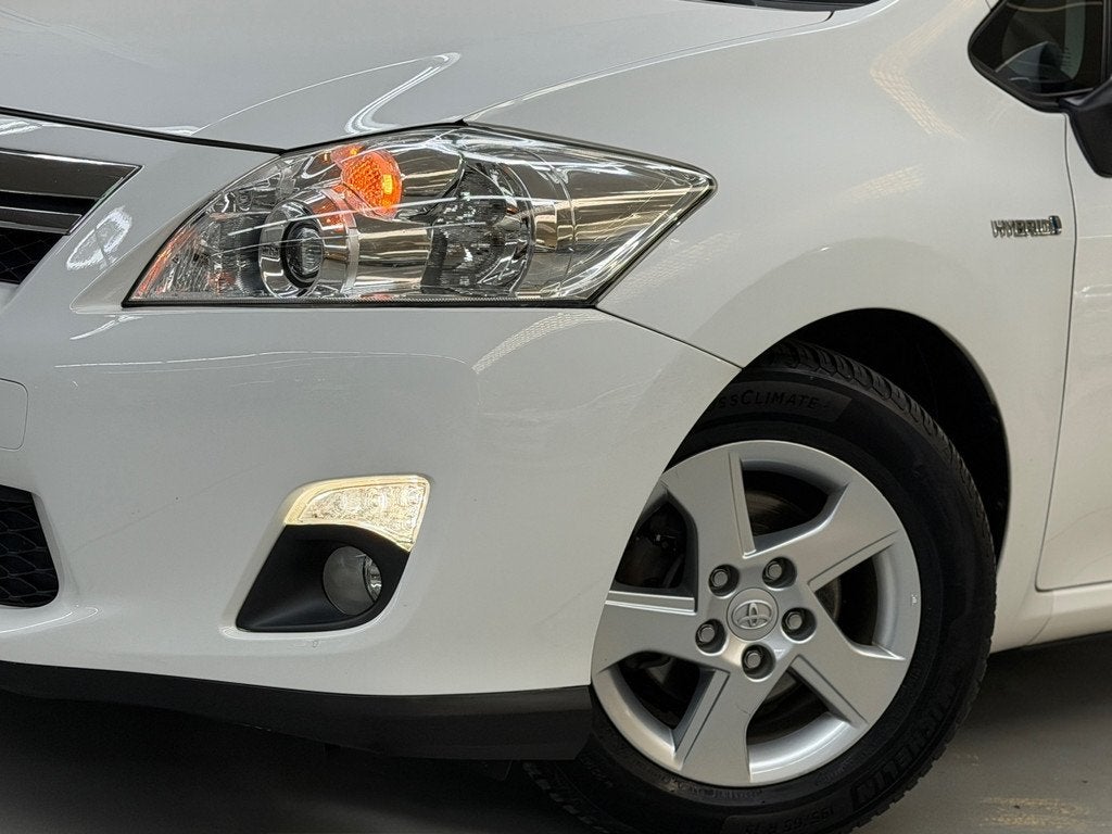 Toyota Auris 1.8 Full Hybrid Business Camera Navi Dealeronde, Auto's, Toyota, Euro 5, Stof, Gebruikt, Zwart