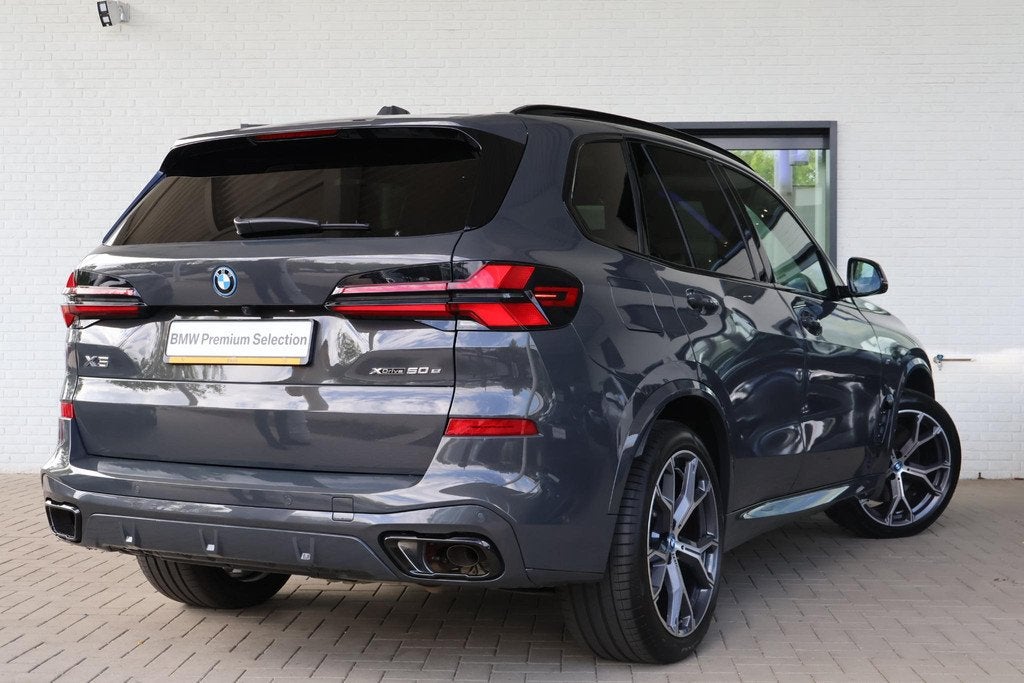 BMW X5 xDrive50e | M Sportpakket Pro | Skylounge Panorama Da, Gebruikt, 2395 kg, Met garantie (alle), Bedrijf