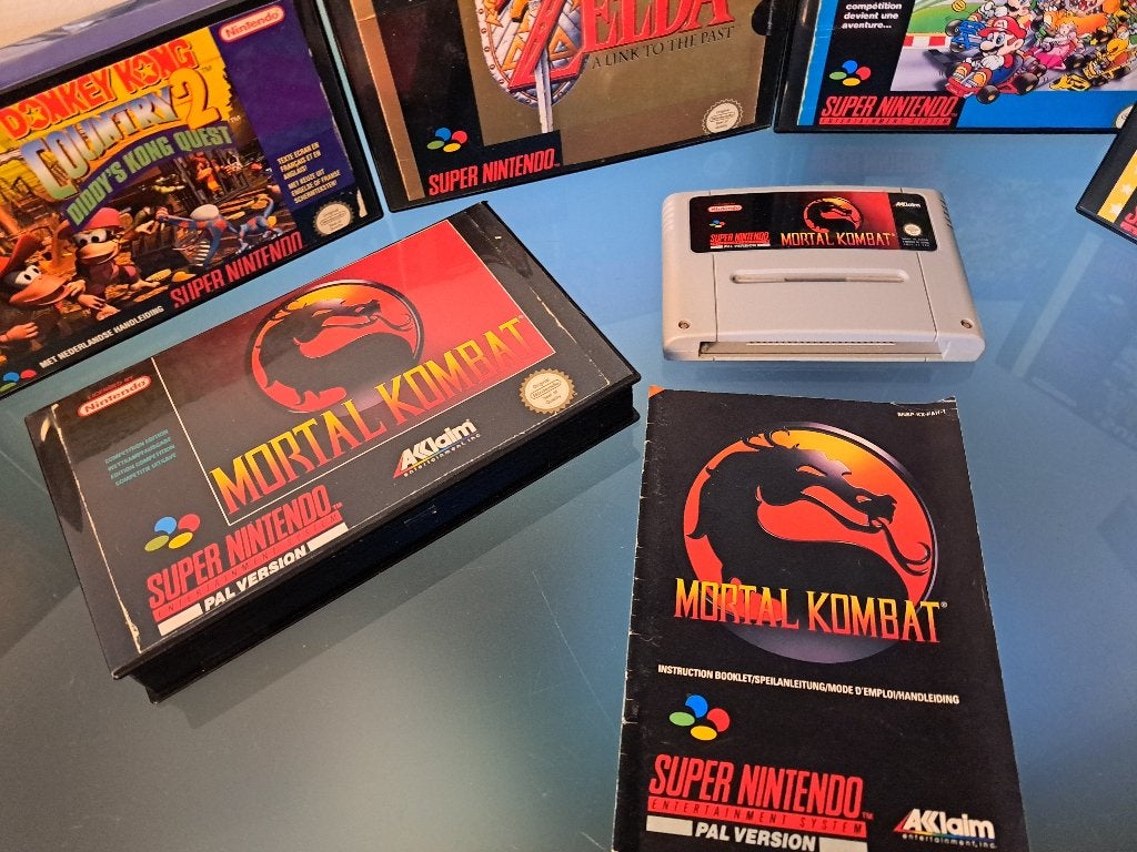 Super Nintendo SNES Mortal Kombat met boekje, Spelcomputers en Games, Games | Nintendo Super NES, Zo goed als nieuw, Vechten, 1 speler