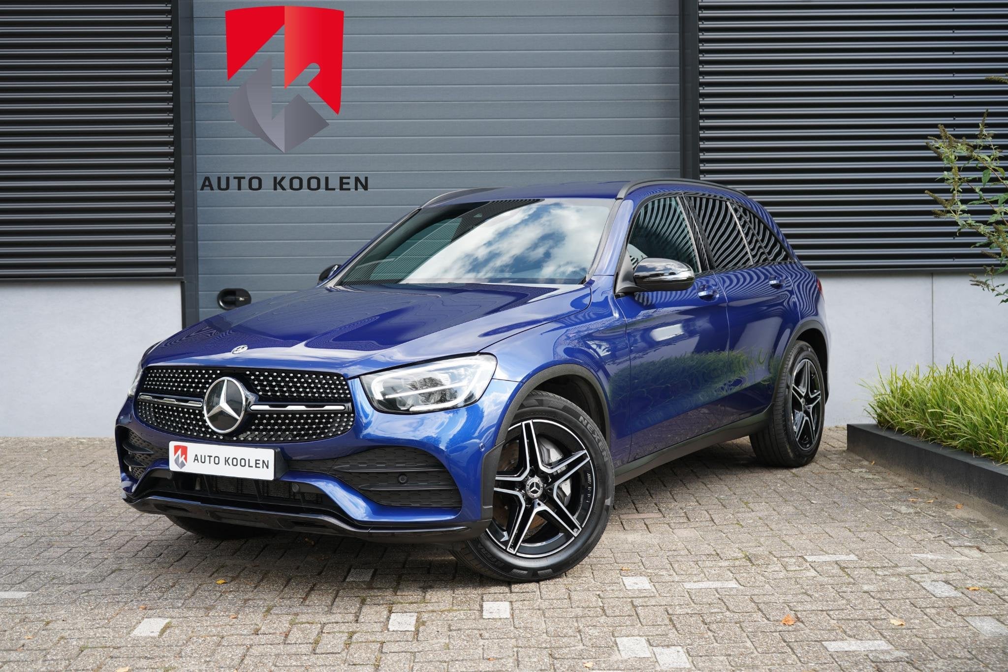 Mercedes-Benz GLC-klasse 200 4MATIC Mild-Hybrid AMG line, Auto's, Automaat, Stof, Gebruikt, Blauw