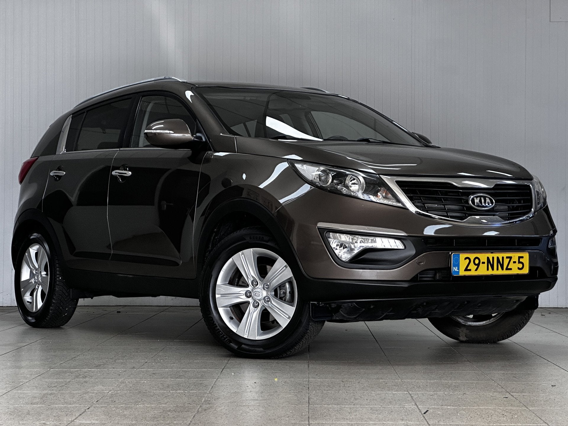 Kia Sportage 2.0 X-ecutive Plus Pack/ Trekhaak!/ 17''LMV/ Cl, Auto's, Gebruikt, Zwart, 4 cilinders, Bruin