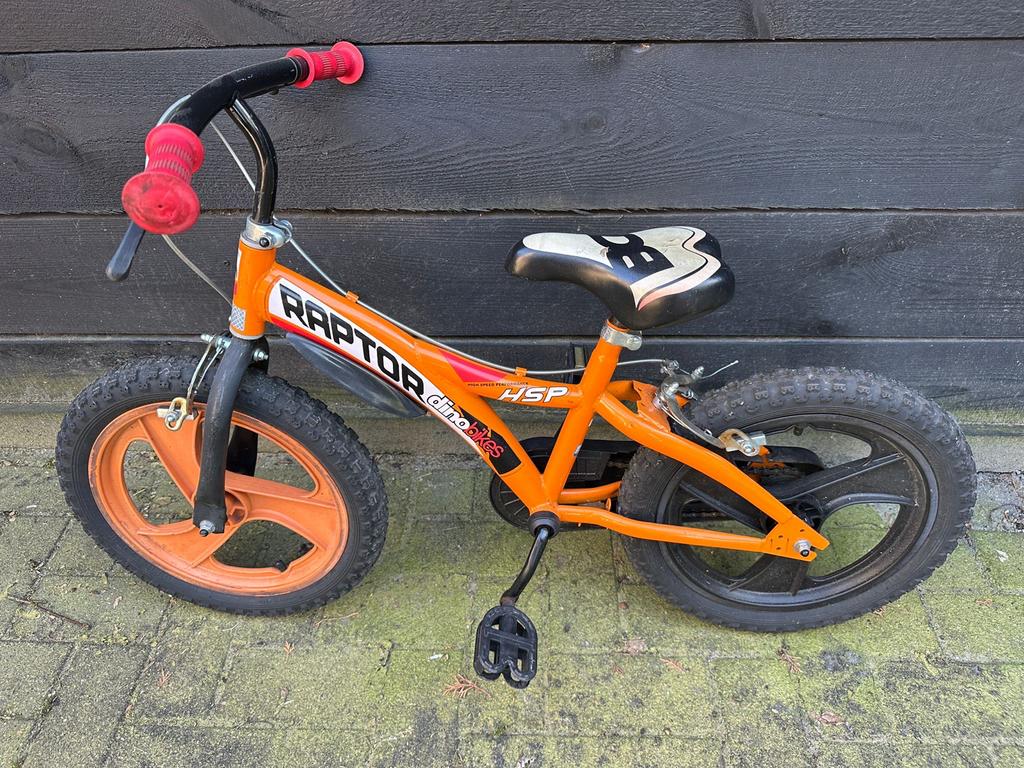 Oranje kinderfiets Raptor Dino Bikes, Ophalen, Gebruikt, Velgrem, 16 tot 20 inch
