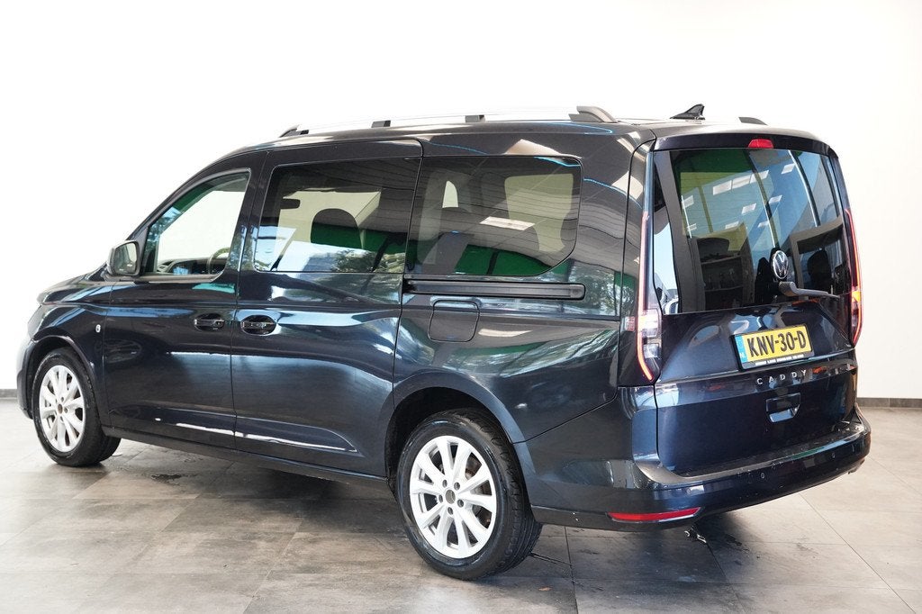 Volkswagen Caddy Maxi 1.5 TSI 7p 7 Persoons PDC Navigatie 24, Auto's, 1556 kg, Stof, 4 cilinders, Zwart