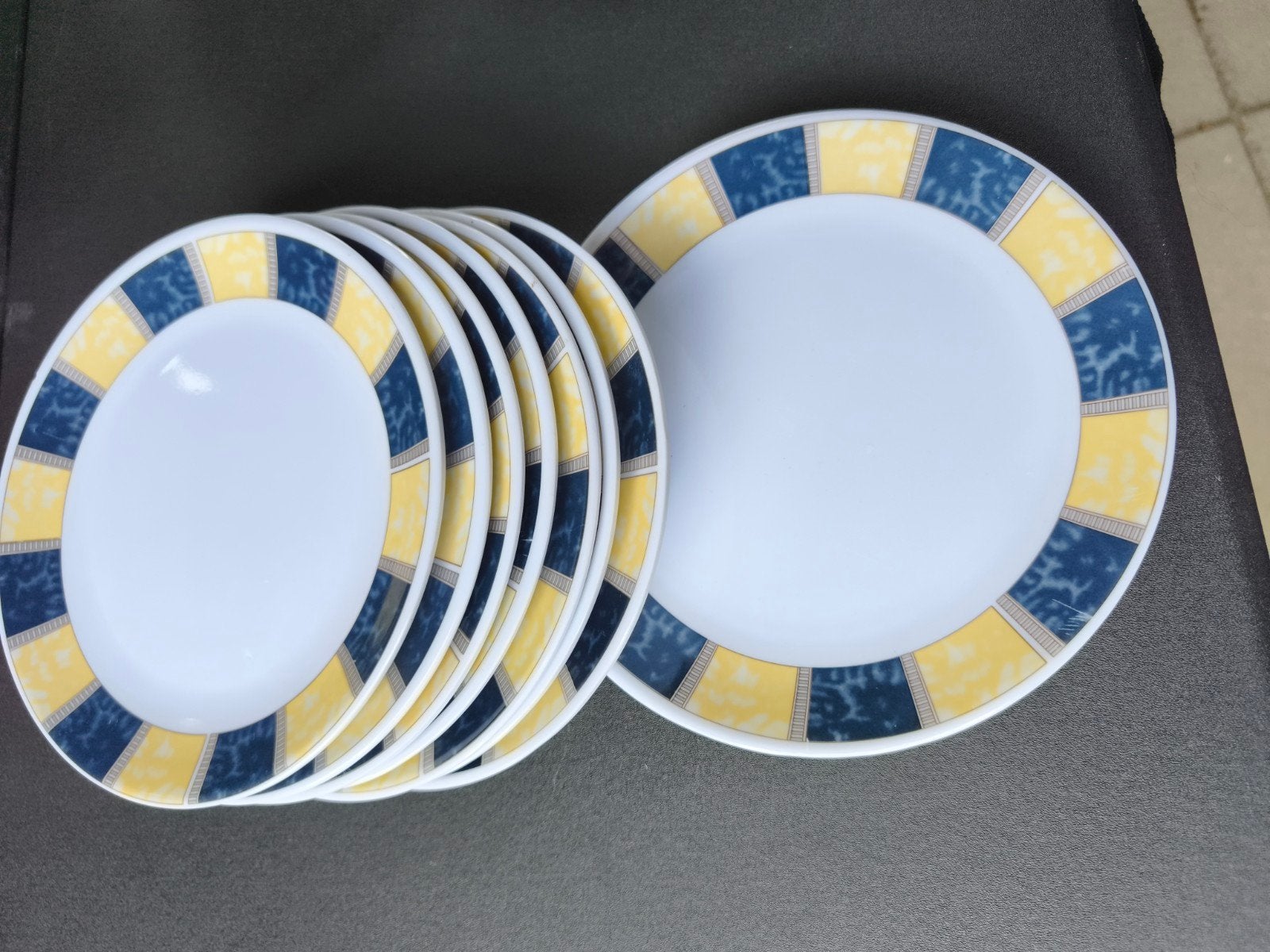 Set van 8 borden met blauw en geel patroon kunststof, Huis en Inrichting, Ophalen of Verzenden