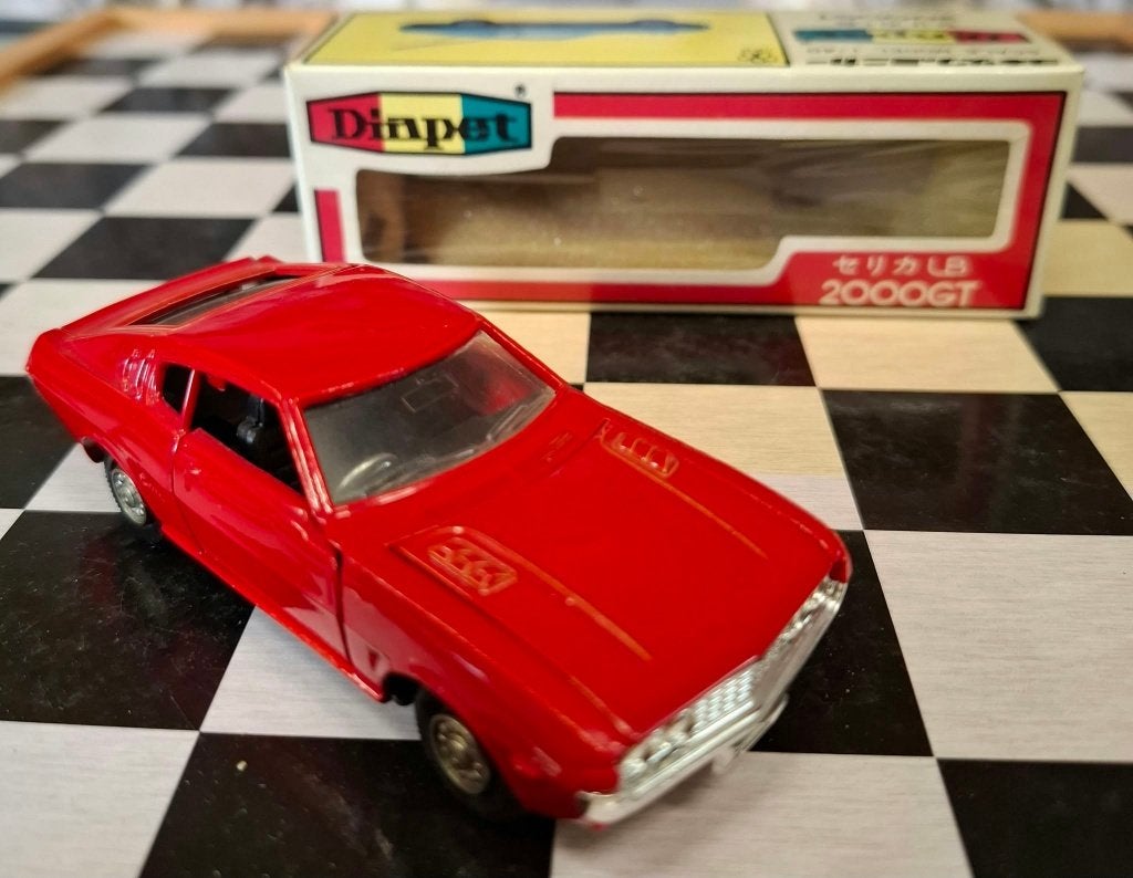 TOYOTA CELICA TA28 DIAPET 1;43 ROOD, Ophalen of Verzenden, Zo goed als nieuw, Auto, Overige merken
