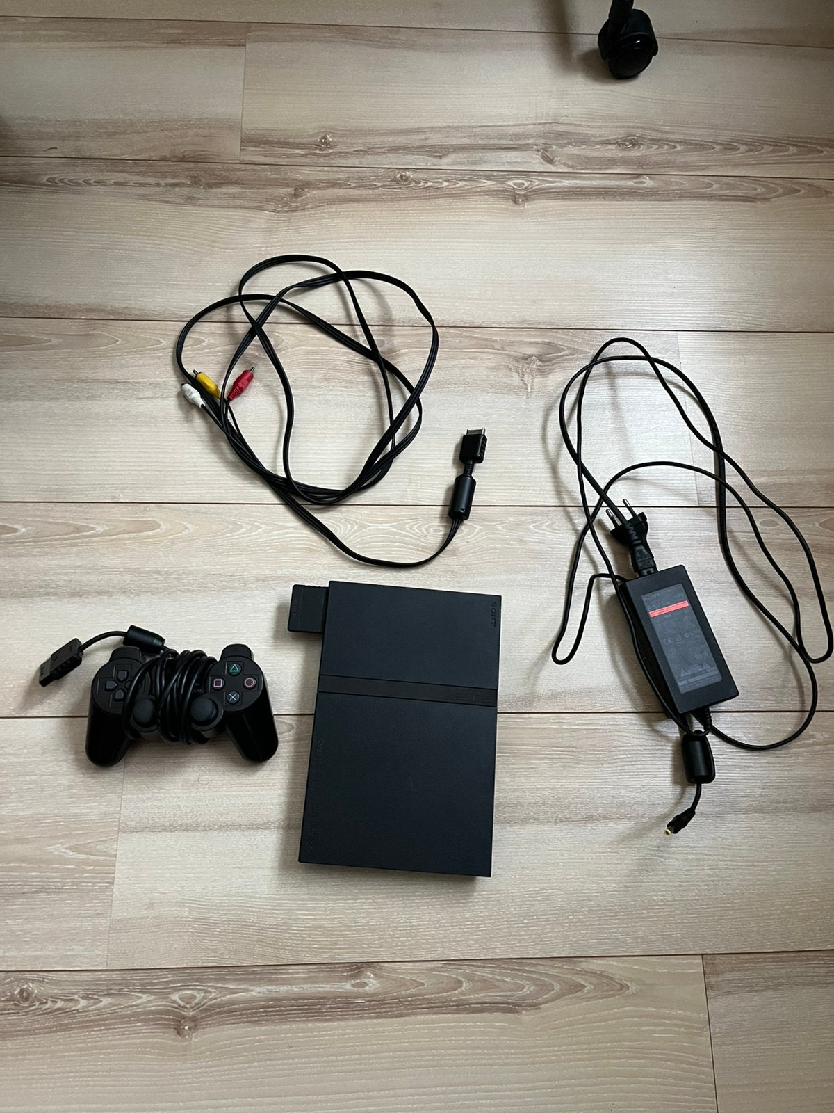 Playstation 2 slim zwart, Zwart, Met games, Ophalen of Verzenden, Zo goed als nieuw