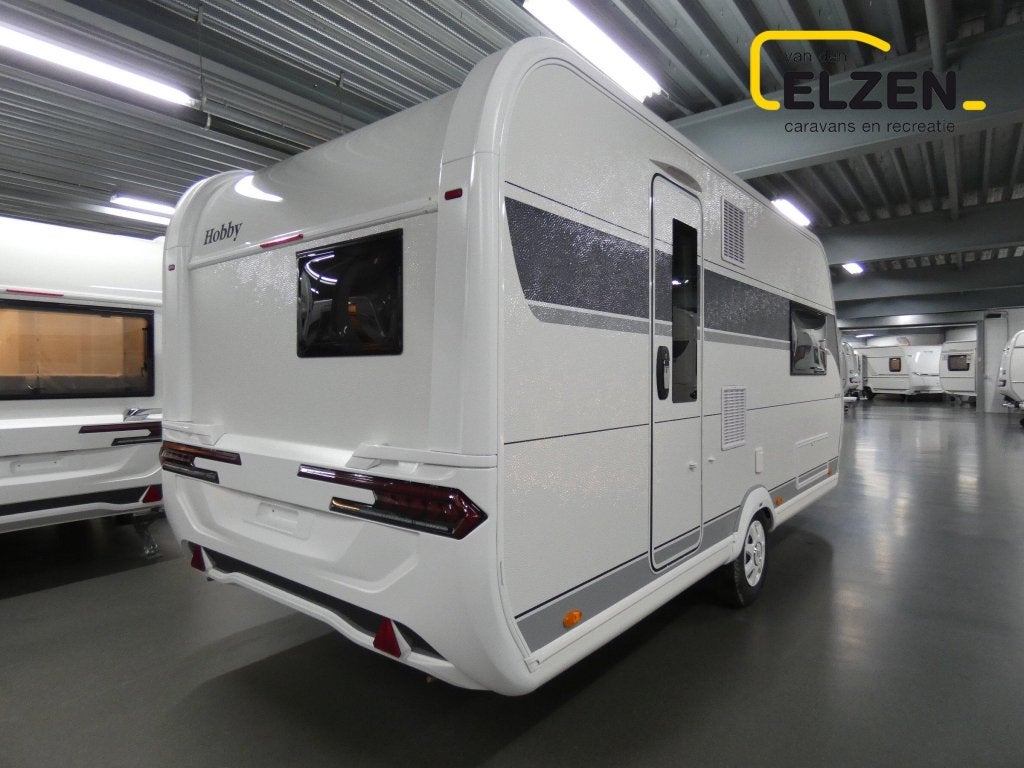Hobby De Luxe 460 SL actie prijs, incl. opties, Caravans en Kamperen, Caravans, Schokbreker, Hobby, Bedrijf, Treinzit