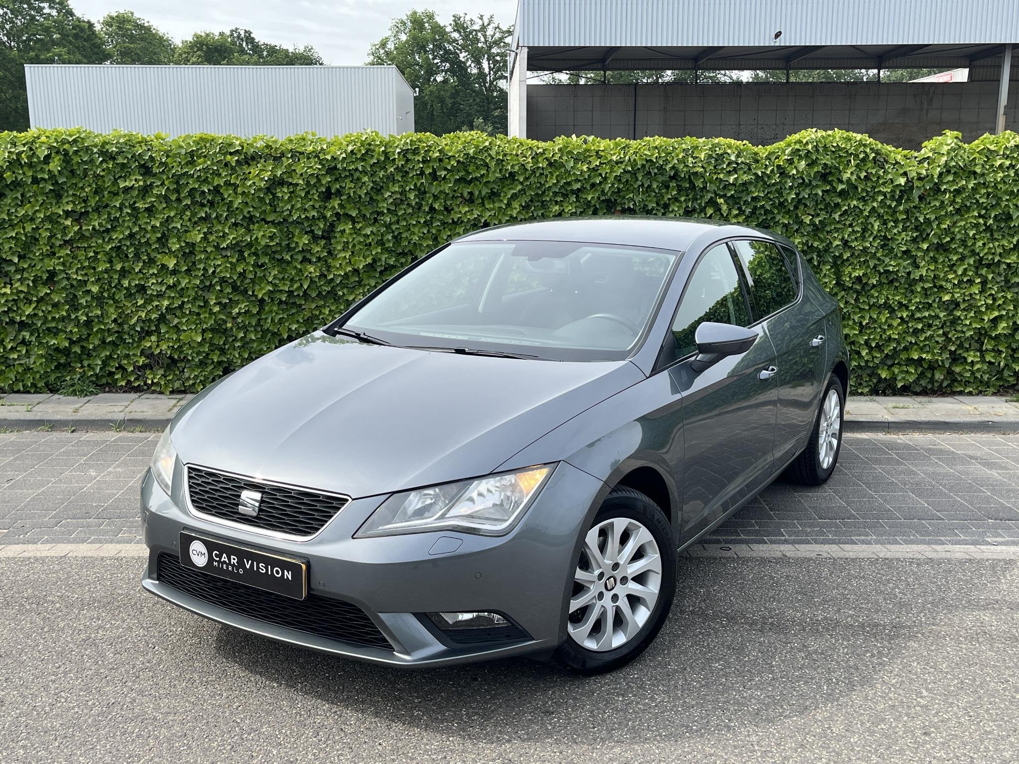 SEAT Leon 1.2 TSI Style * Airco * Cruise * Dealerond. * Gara, Auto's, Voorwielaandrijving, Euro 5, Gebruikt, Zwart