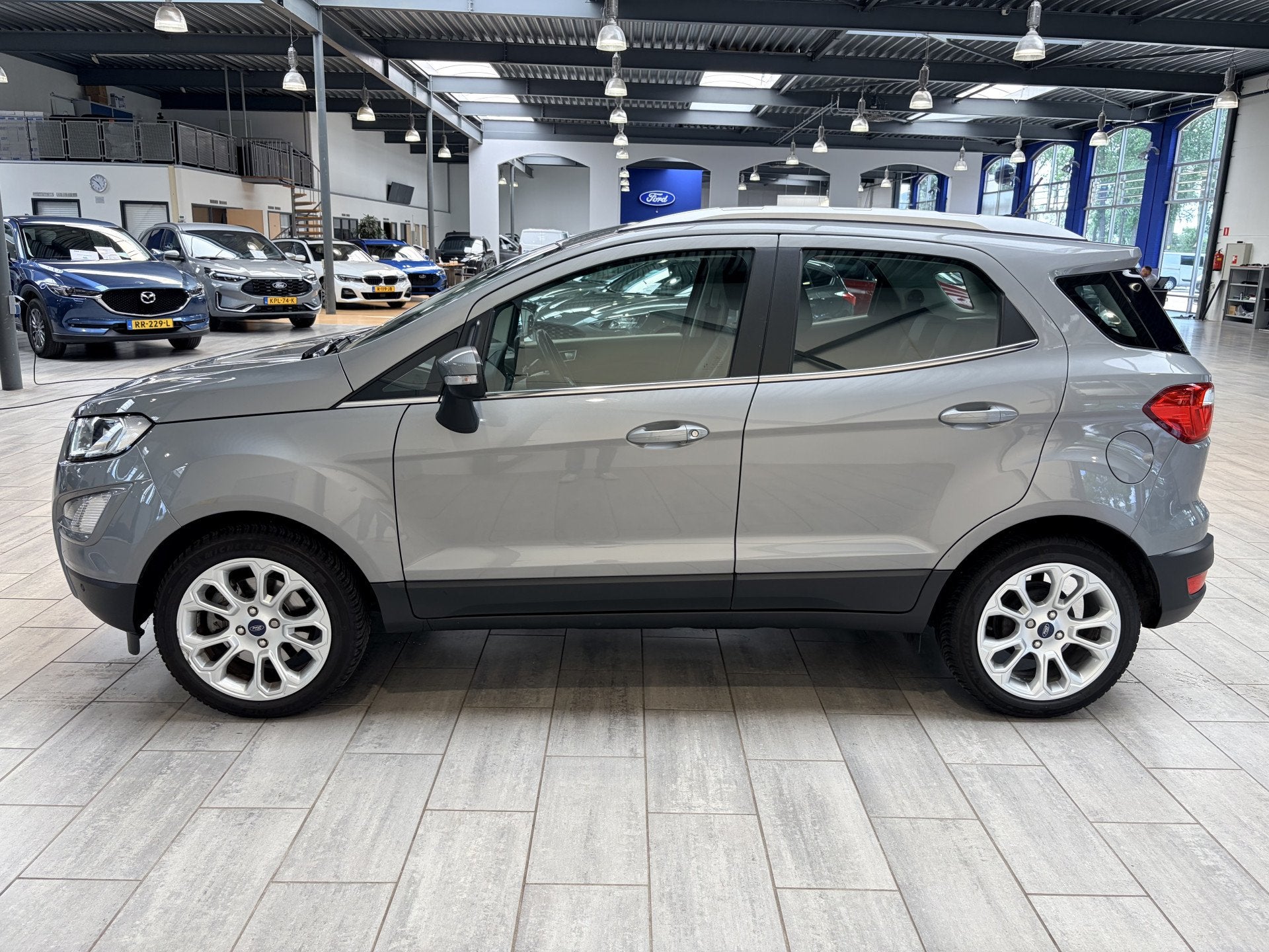 Ford EcoSport EcoBoost 125 pk Titanium | Camera | Winter Pac, Auto's, Ford, Gebruikt, Euro 6, Leder en Stof, Origineel Nederlands